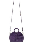 Round purple croc leather bag with top handle and cross body strap